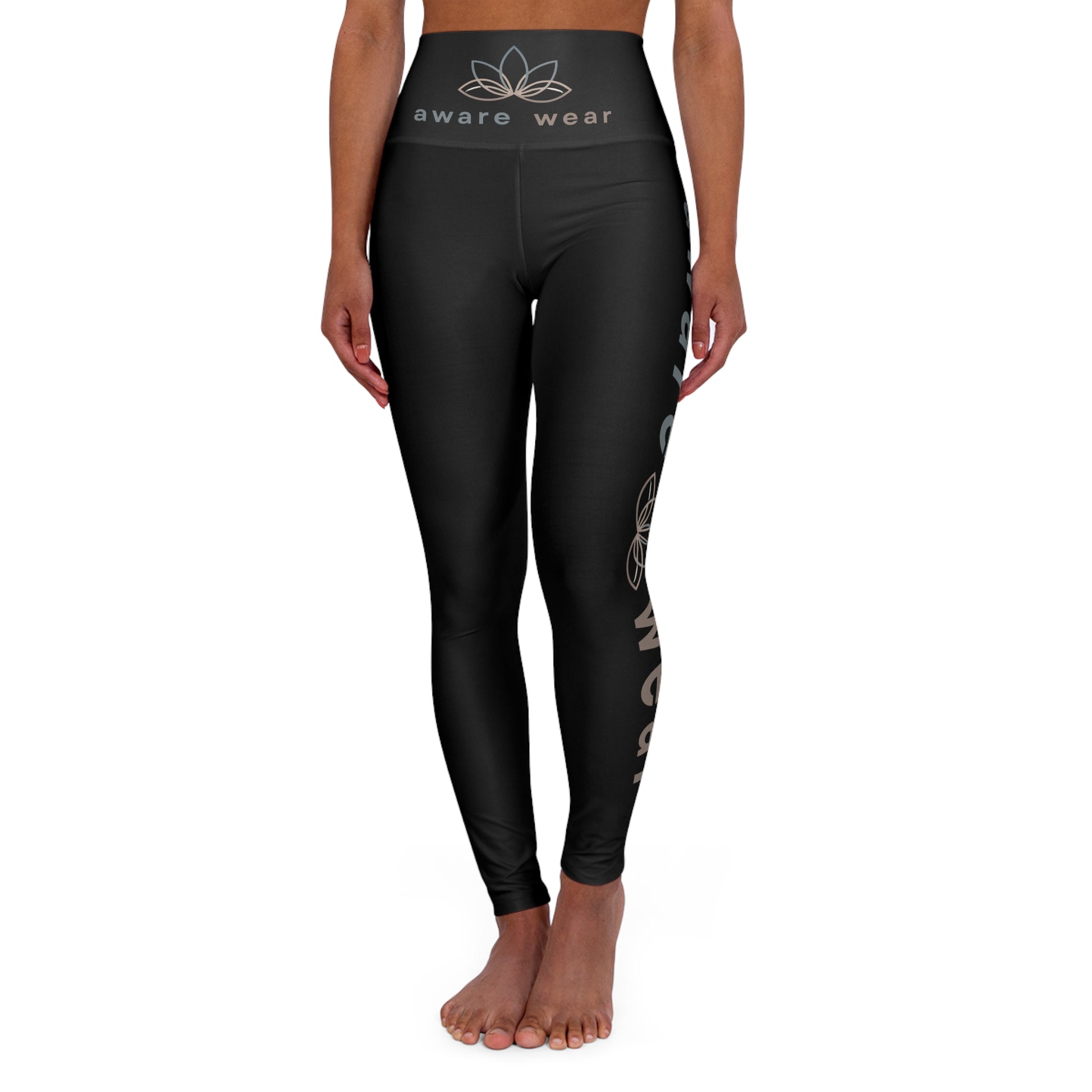 Black leggings with 'aware wear' branding on a white background front view