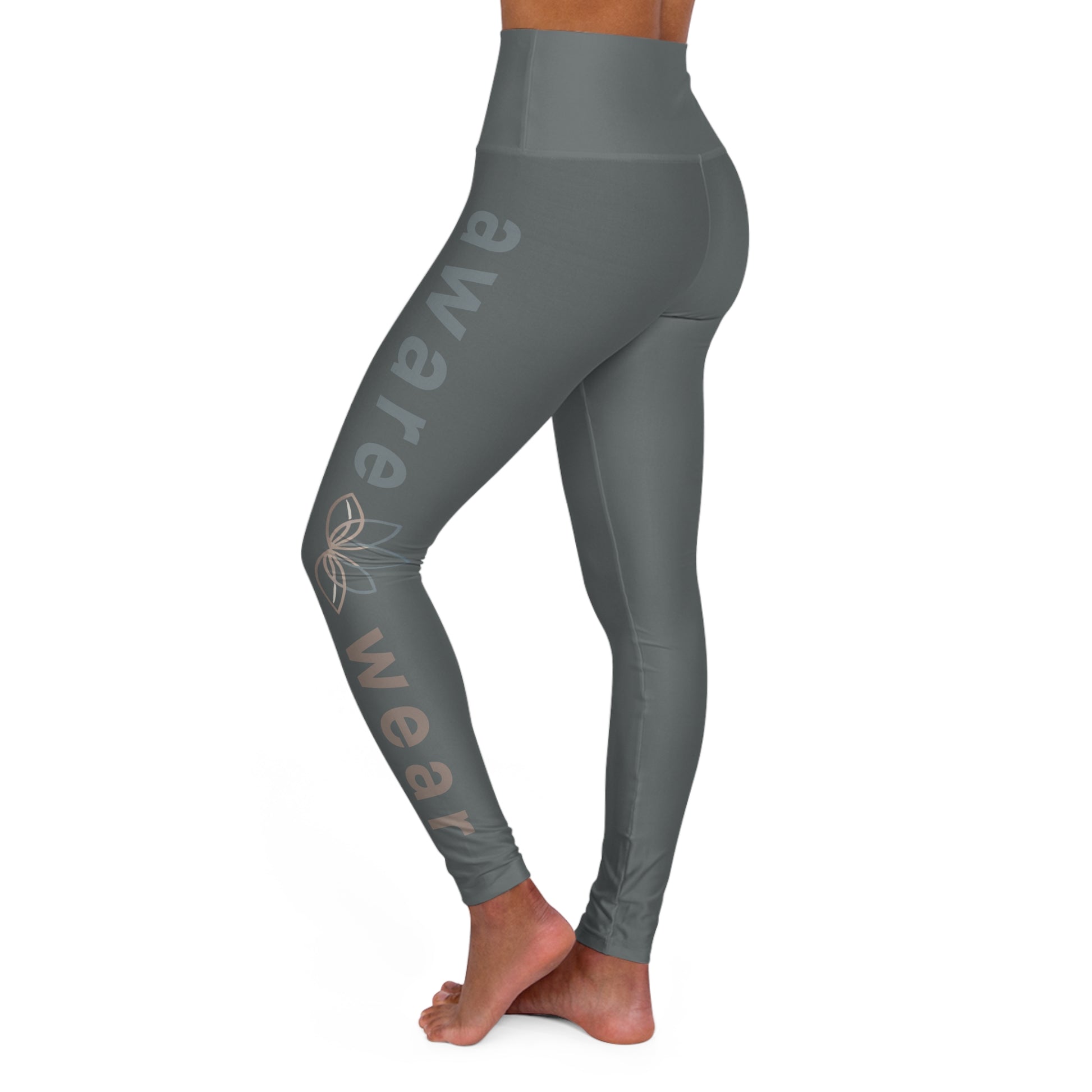 Gray leggings with 'ware wear' branding on a white background side view